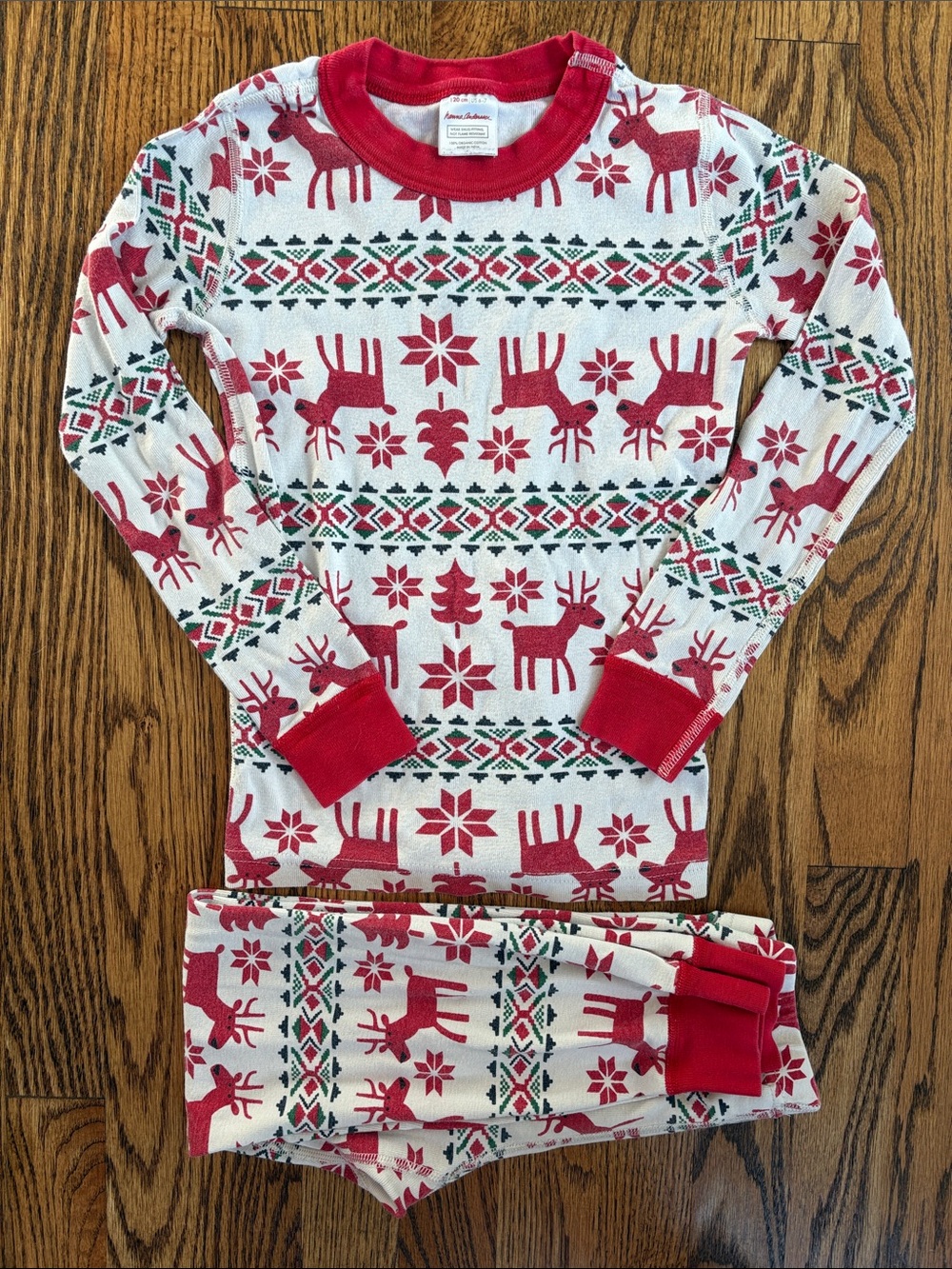 Hanna Andersson red and white reindeer print two piece pajama set, size 6-7.